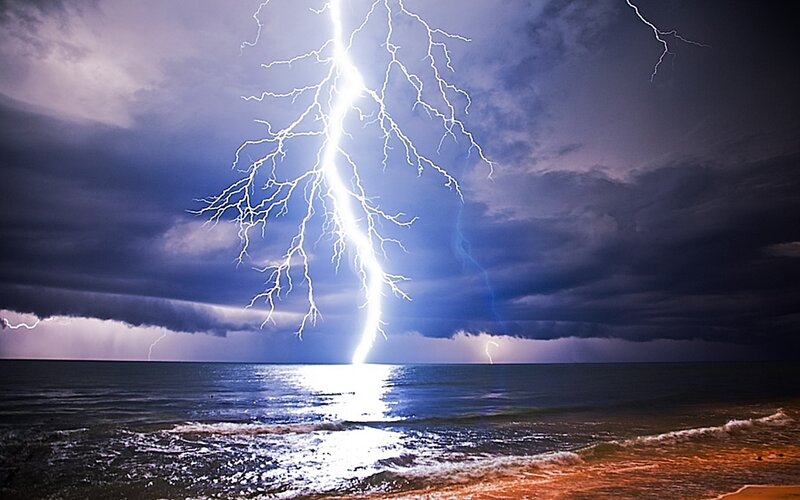 Lightning strike over ocean