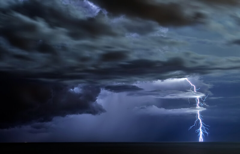 Lightning strike over ocean