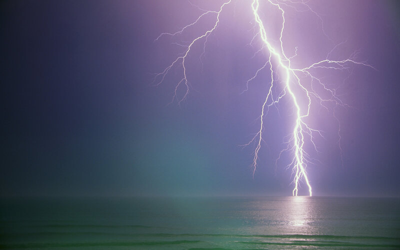 Lightning strike over ocean