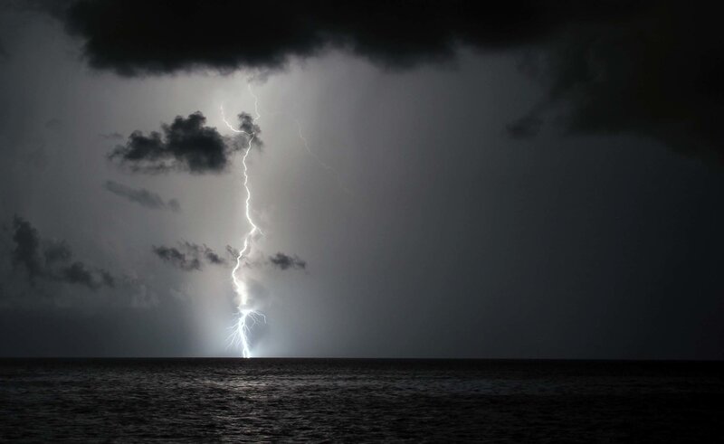 Lightning Strike over Ocean — Black, Dramatic