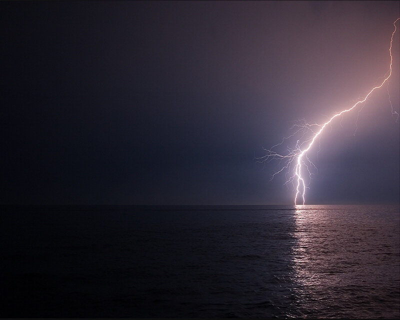 Lightning Strike over Ocean — Dark Blue, Dramatic