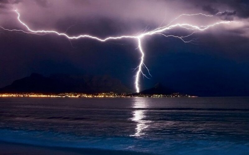 Lightning Strike over Ocean — Dark Blue