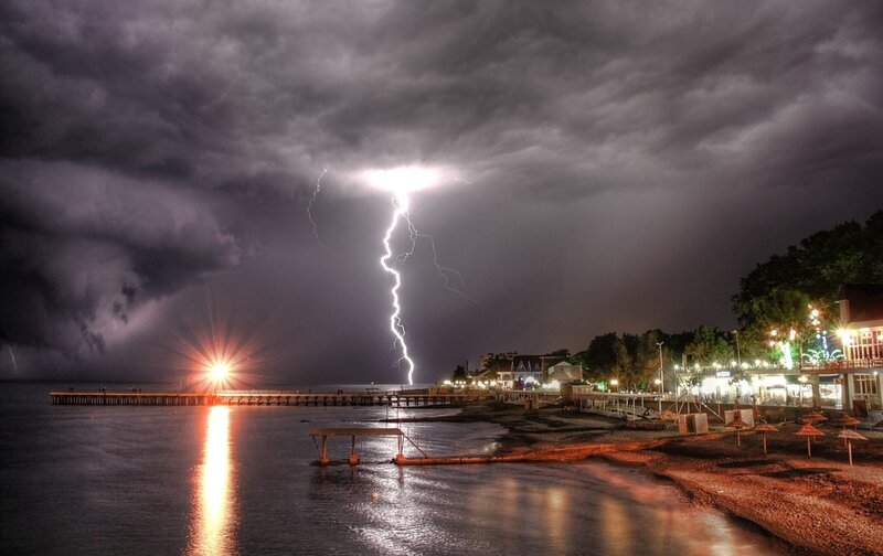 Lightning Strike over Pier — Gray, Dramatic