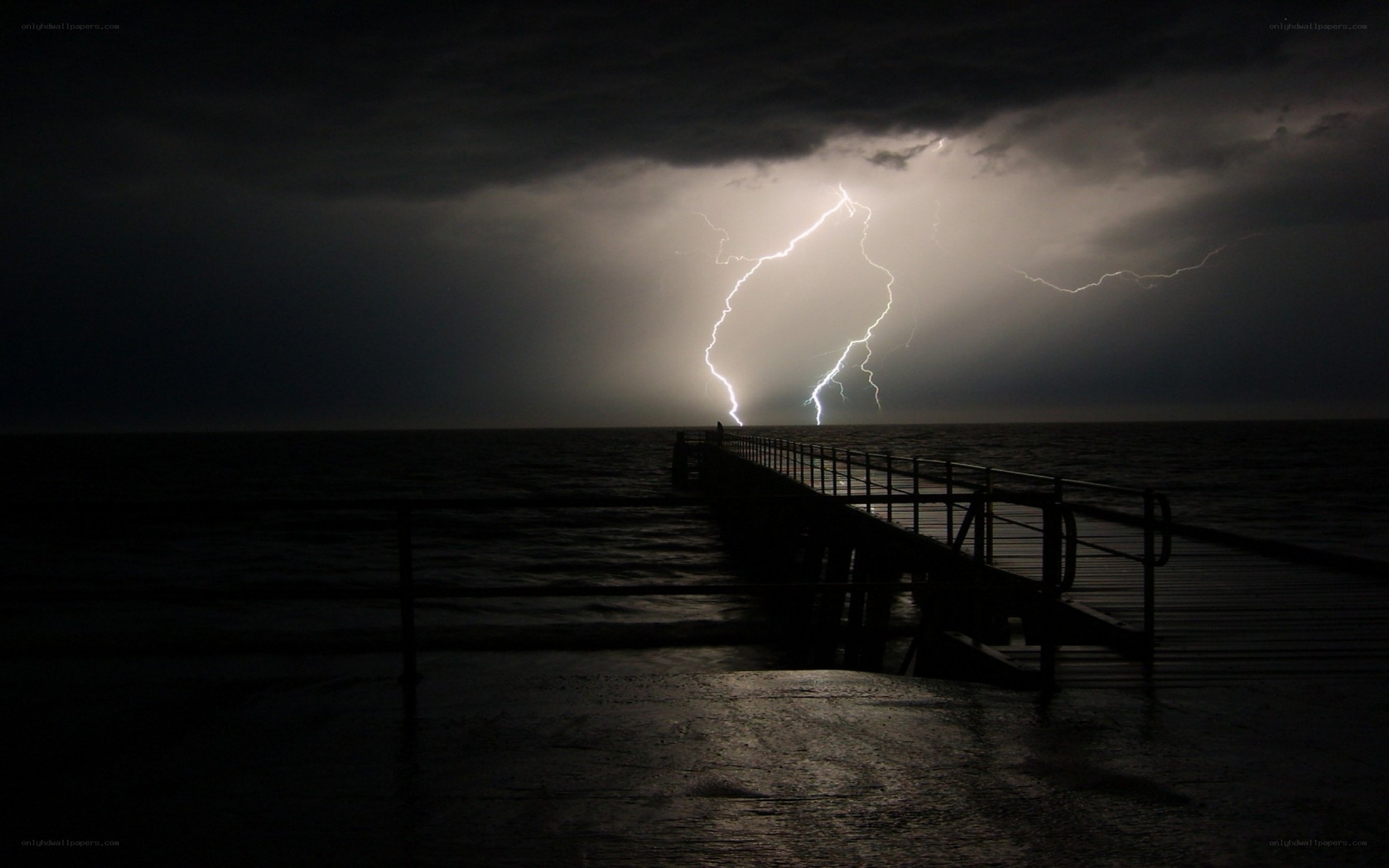 Lightning strike over pier
