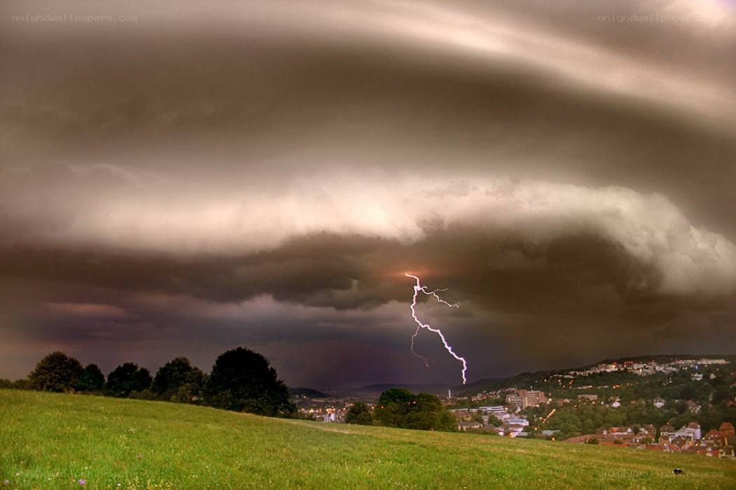 Lightning strike over town