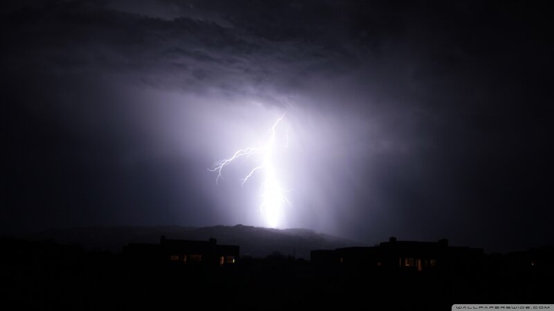 Lightning strike over town