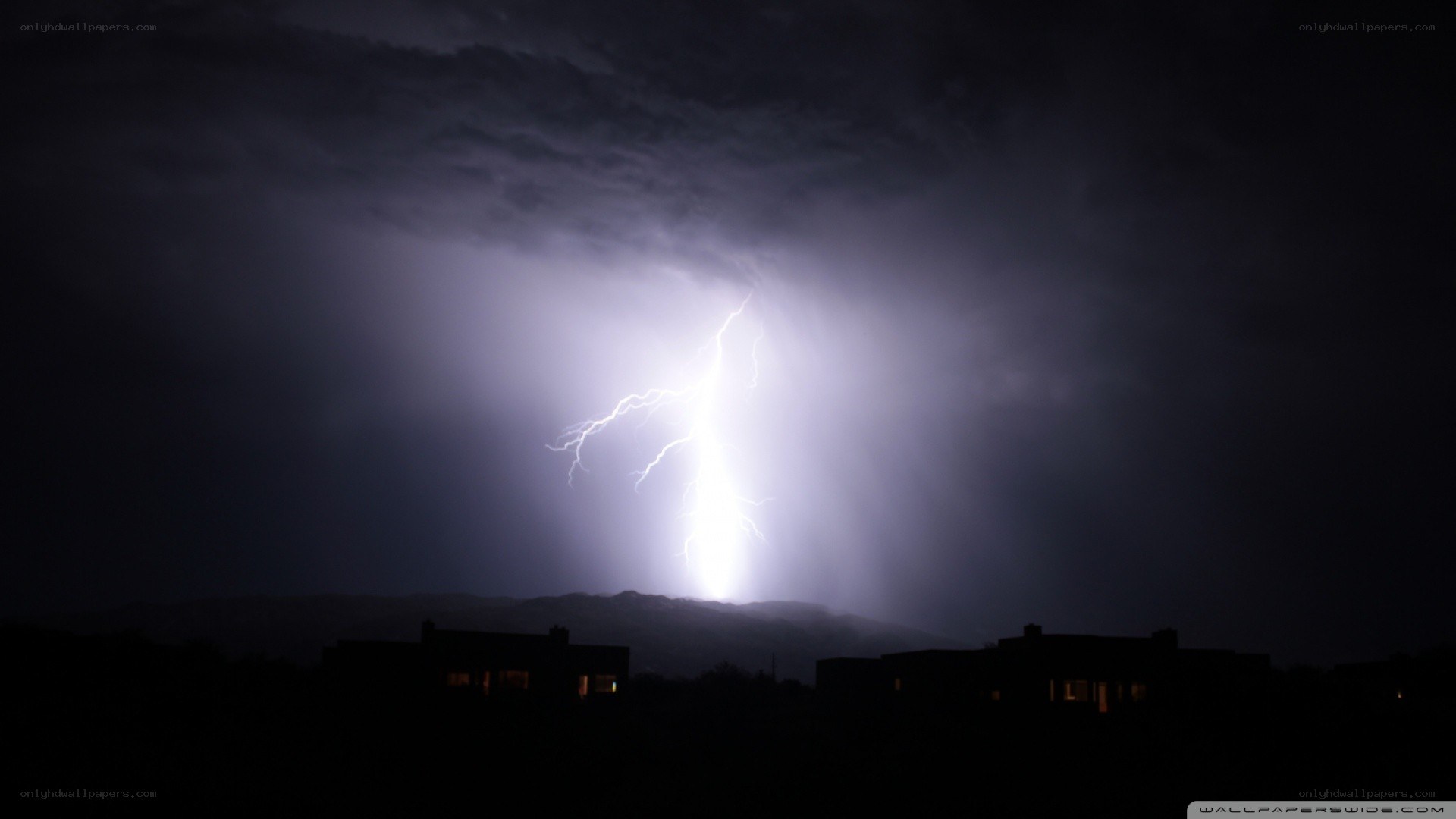 Lightning strike over town