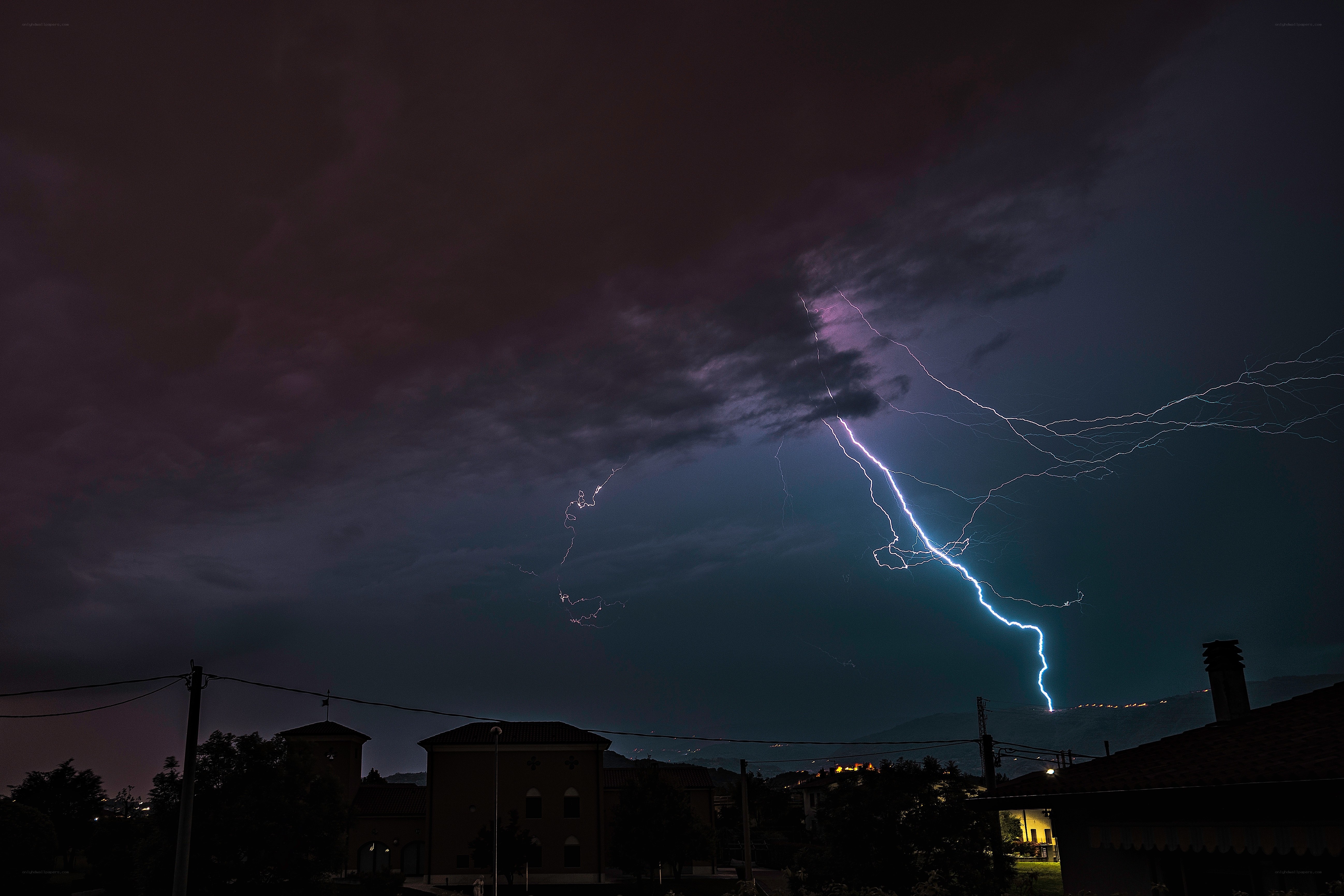 Lightning strike over town
