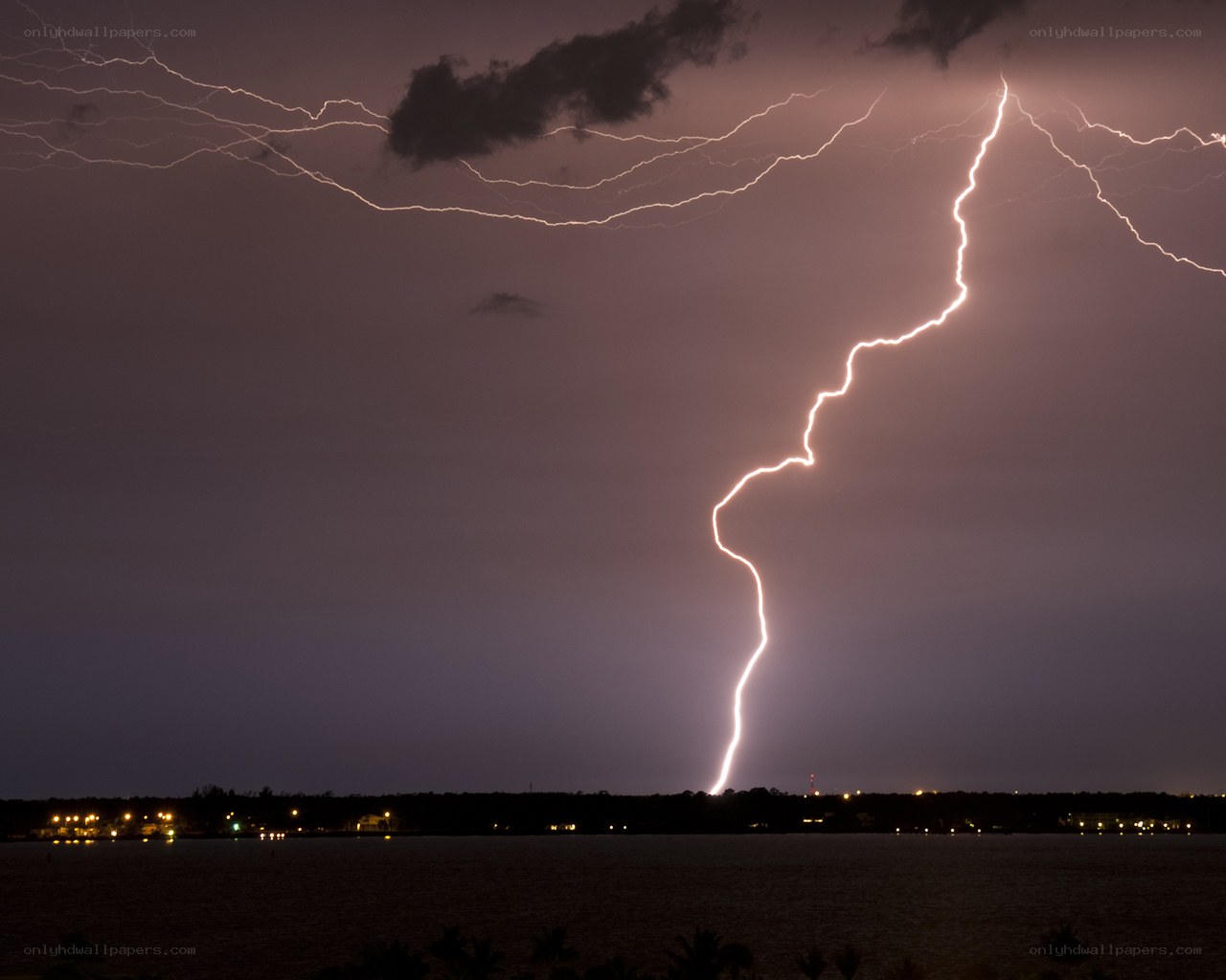 Lightning strike over water