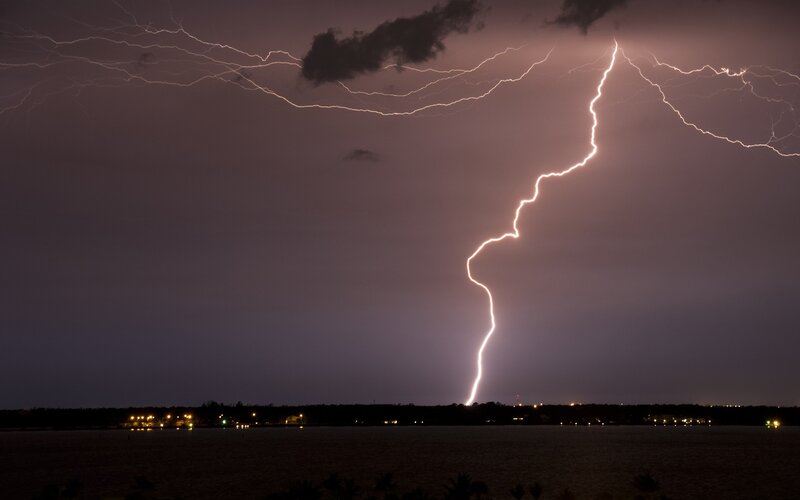 Lightning Strike over Water — Purple