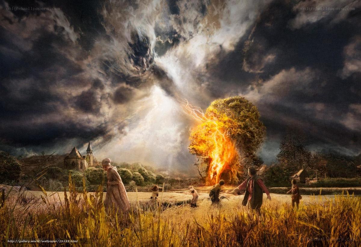 Lightning strikes burning tree
