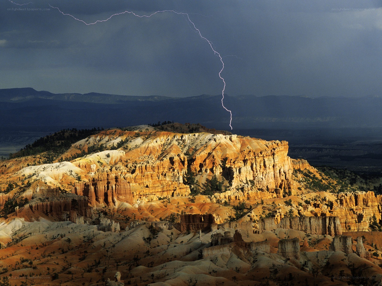 Lightning strikes canyon landscape