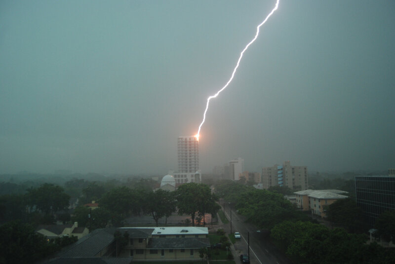 Lightning strikes city building