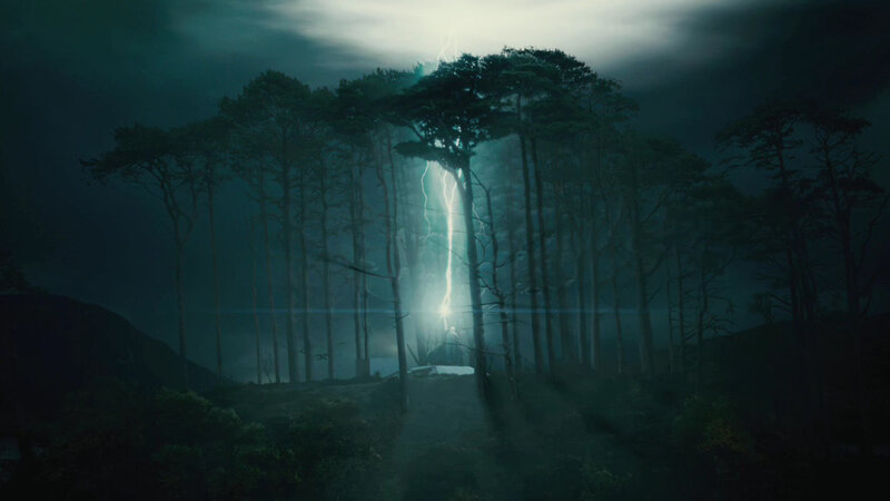 Lightning strikes forest at night