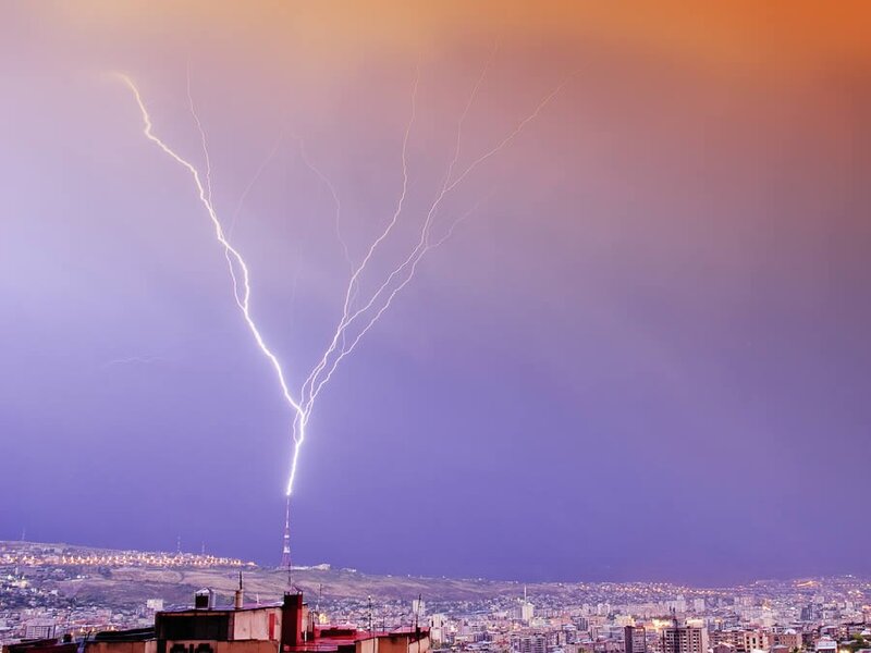 Lightning strikes over city
