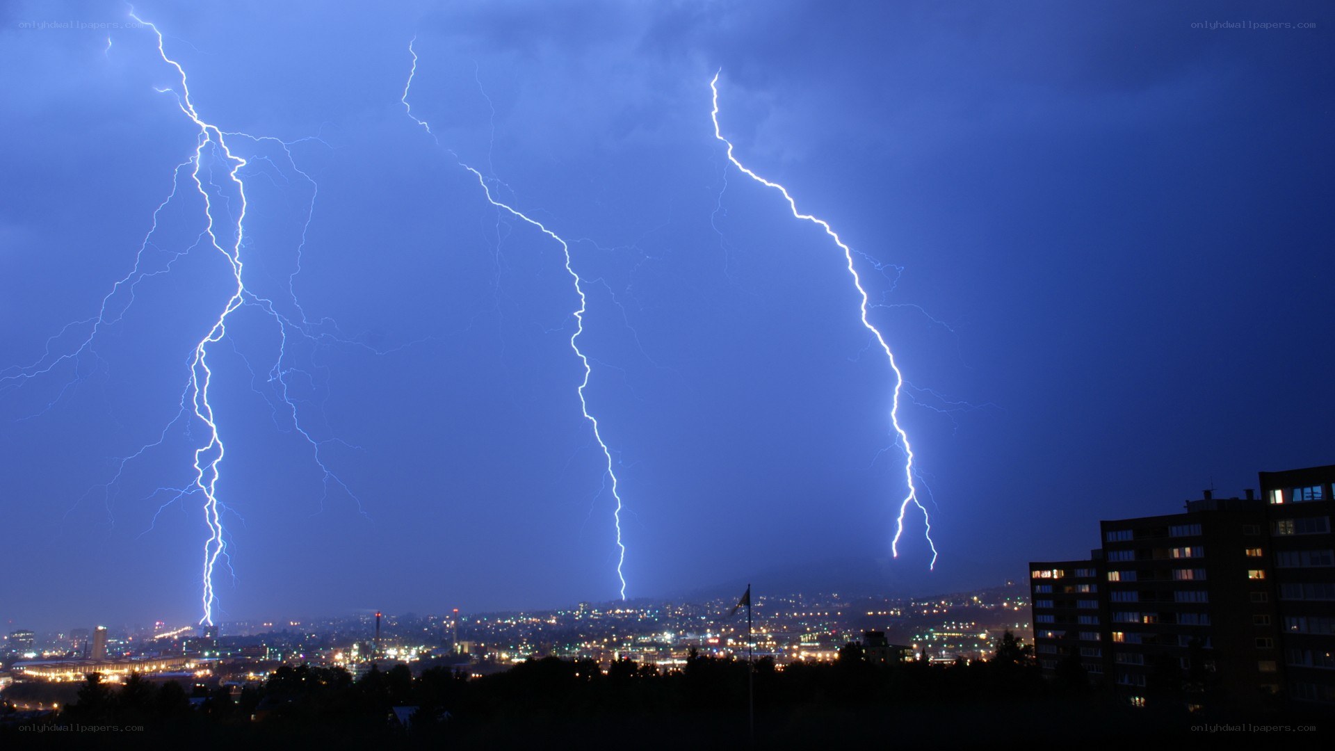 Lightning strikes over city