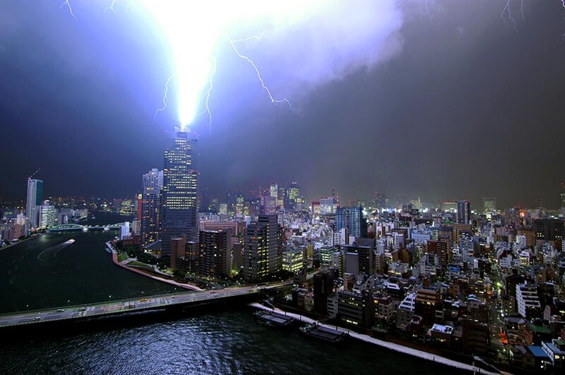 Lightning strikes over city