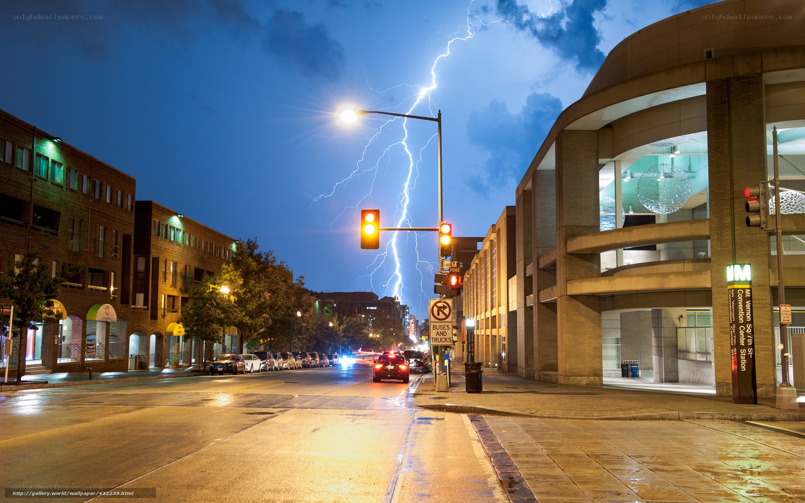 Lightning strikes over city street