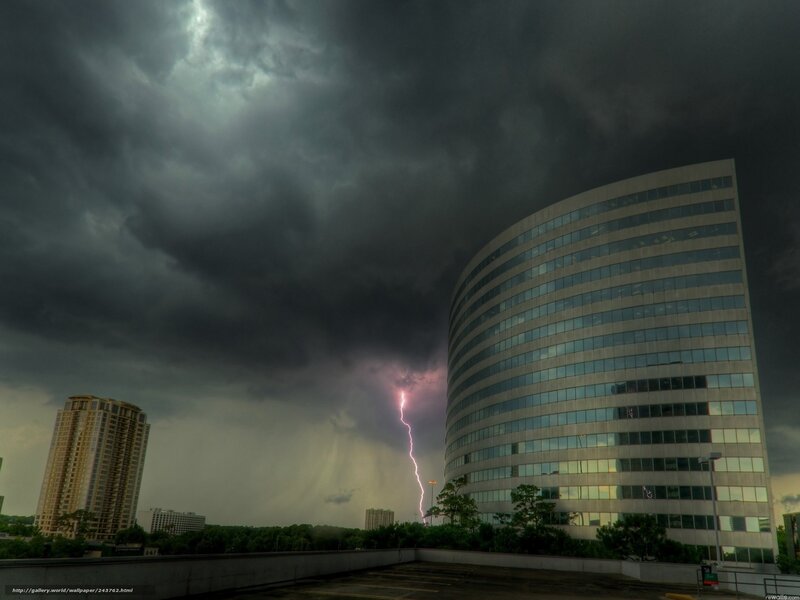 Lightning strikes over city