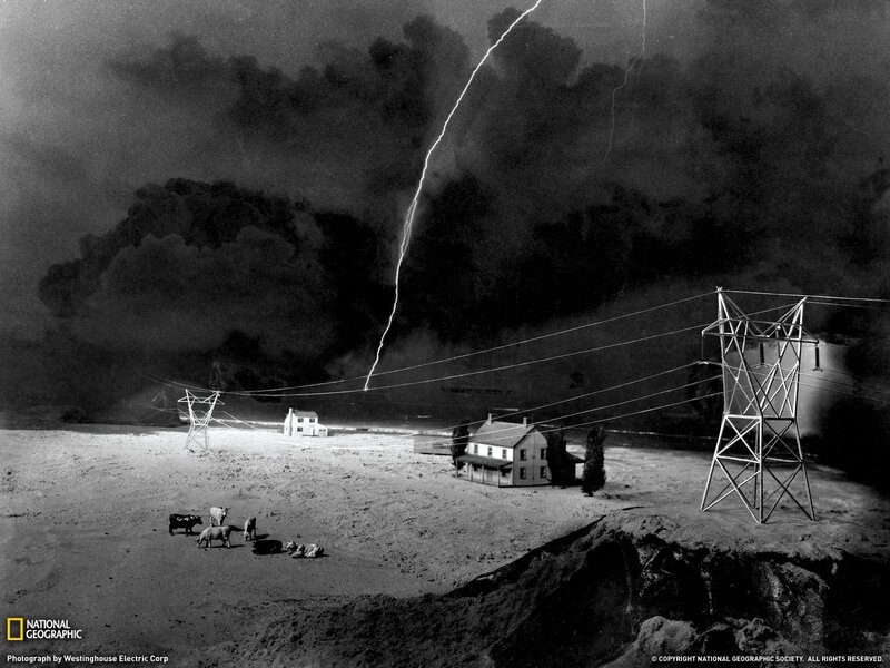 Lightning strikes over rural landscape
