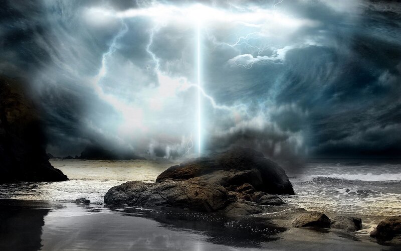 Lightning strikes rocky shore