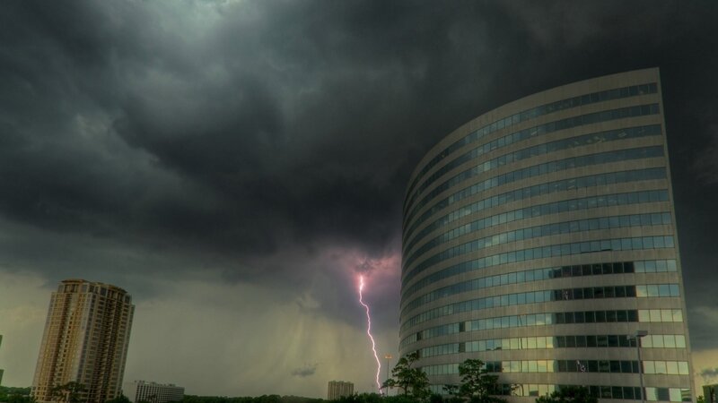 Lightning Striking Near Building — Gray, Dramatic