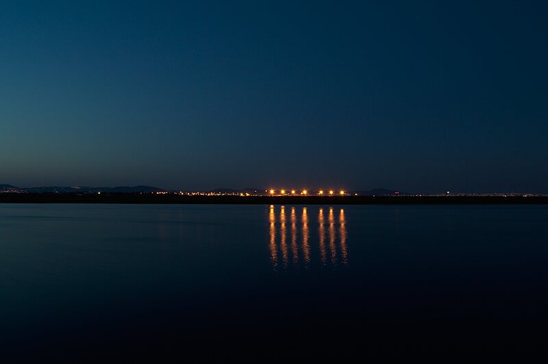 Lights on Water at Night — Blue