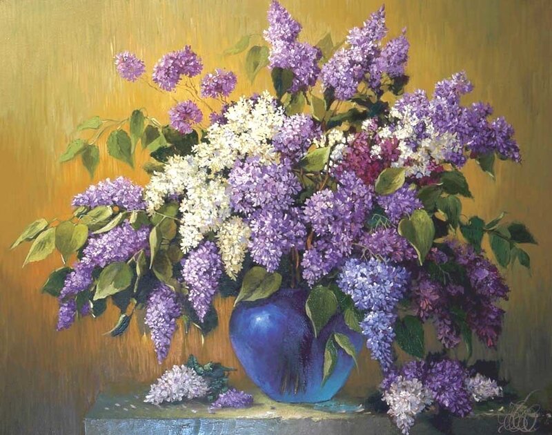 Lilac bouquet in a blue vase