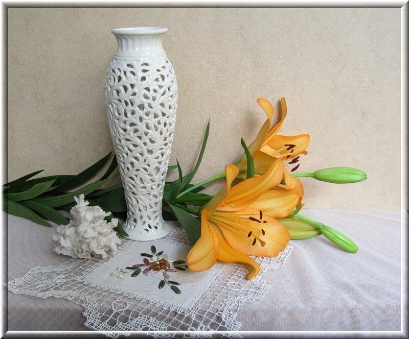 Lilies and white vase