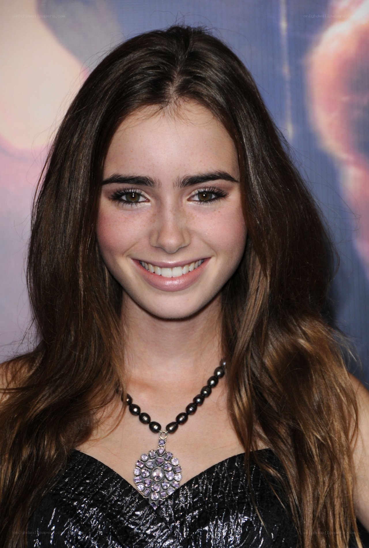 Lily Collins at event
