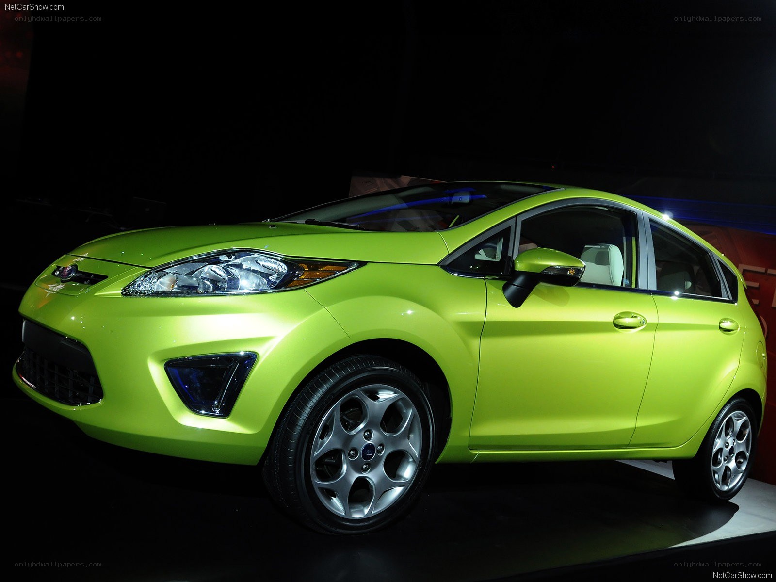lime green Ford Fiesta hatchback