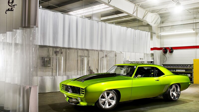 lime green muscle car in garage