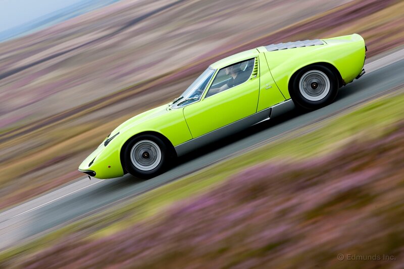 lime green sports car in motion