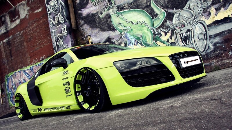 lime green sports car with graffiti