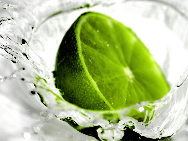 Lime Slice in Water — Green, Dynamic, Photograph