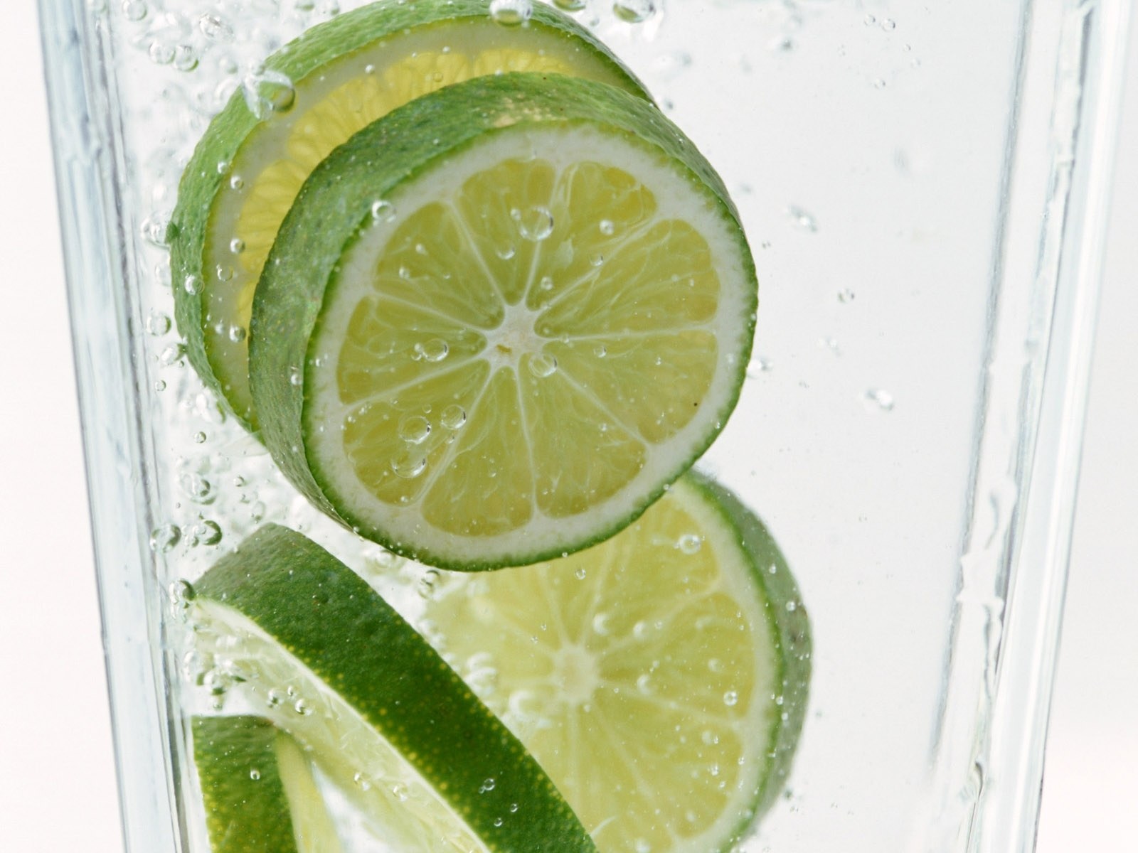 Lime slices in sparkling water