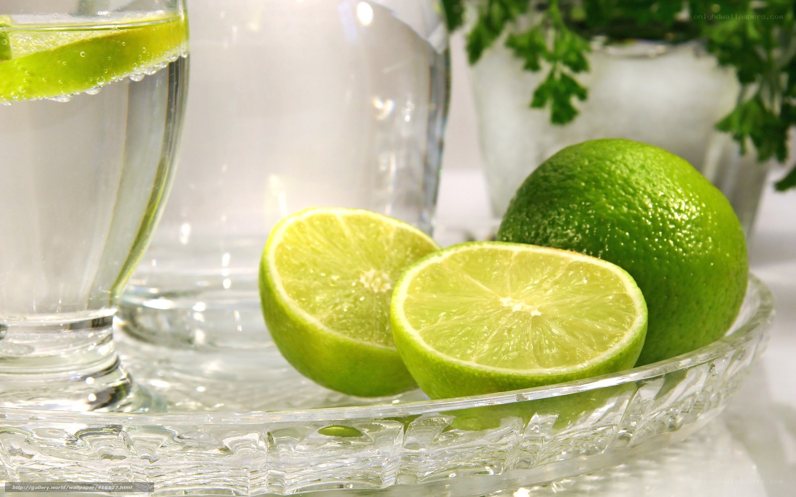 Limes and a glass of water
