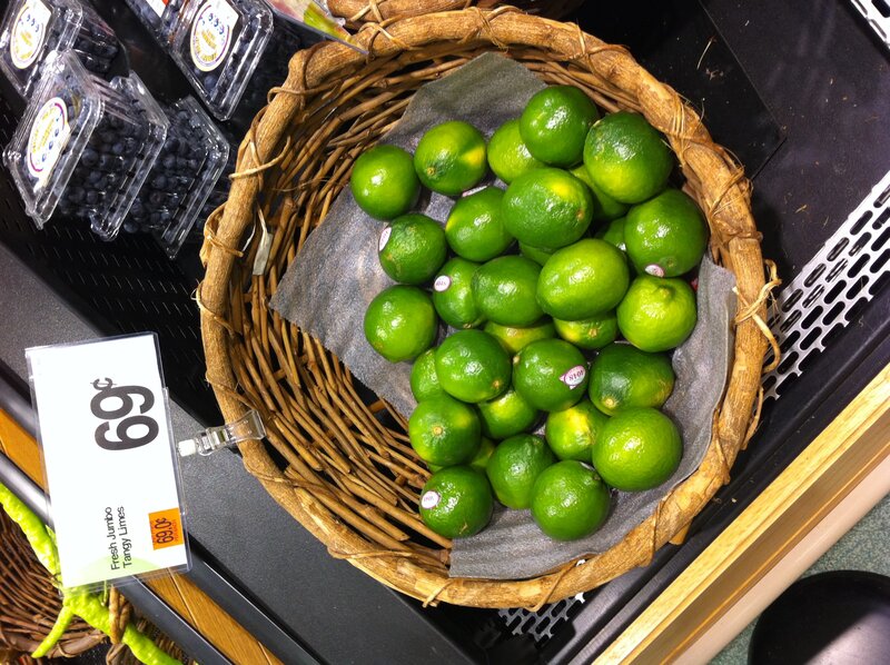 Limes in a basket at market