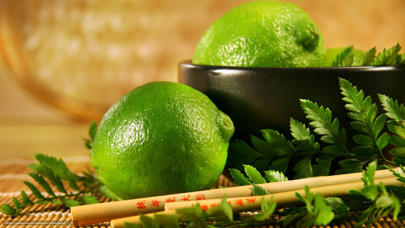 Limes with chopsticks and herbs