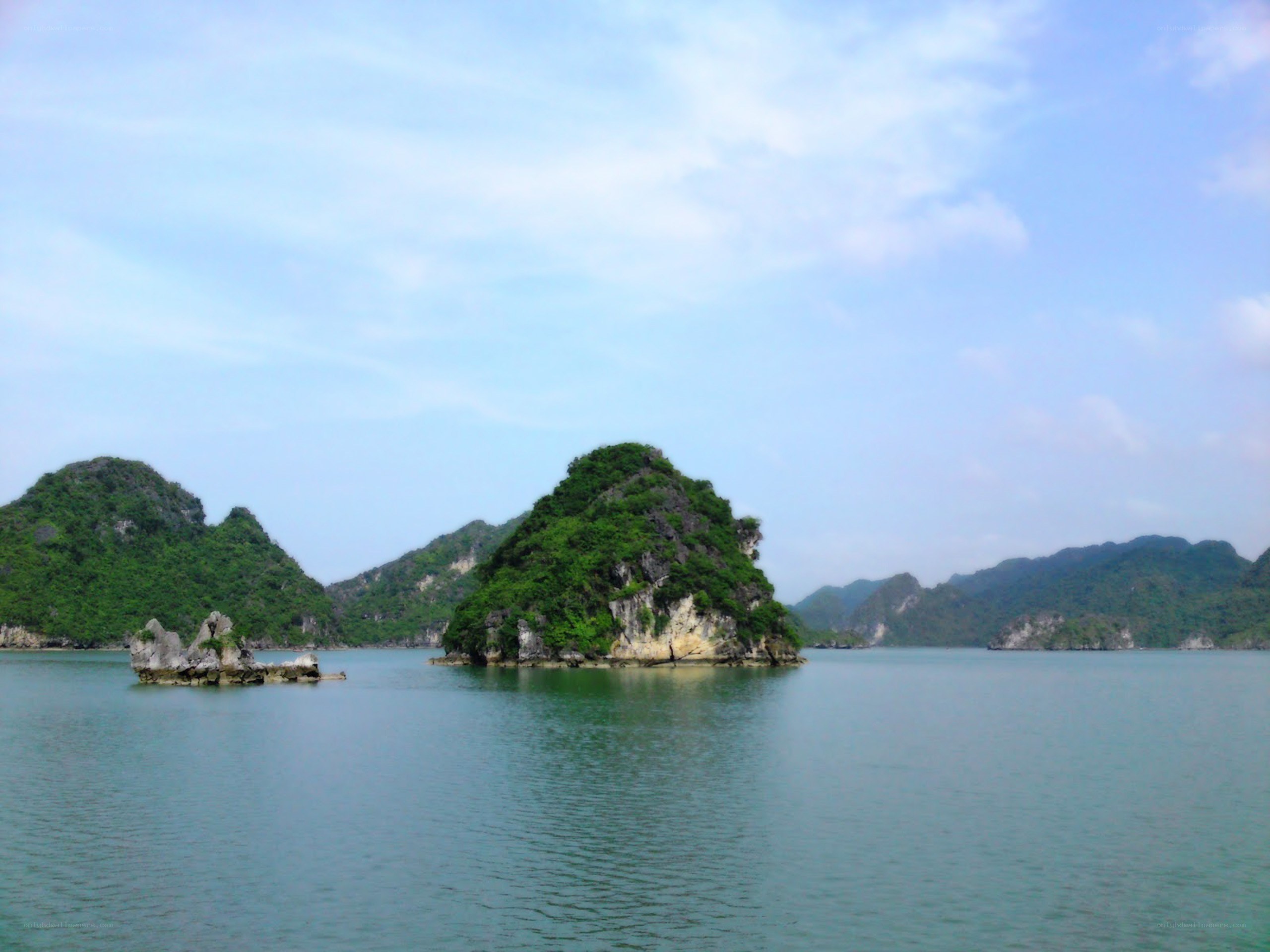 Limestone islands in a calm bay