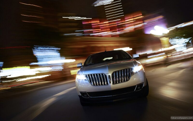 Lincoln car at night in city