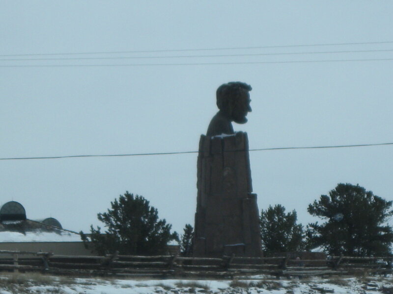 Lincoln statue in snowy landscape
