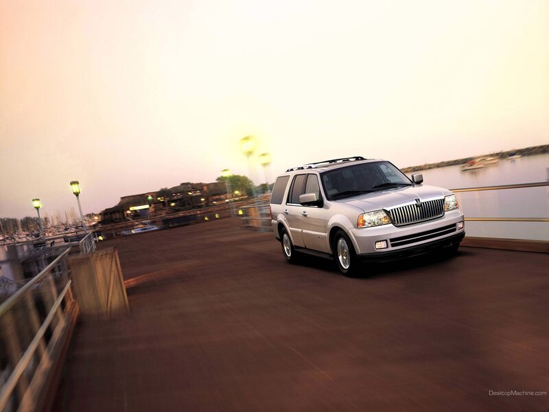 Lincoln SUV on a pier at dusk