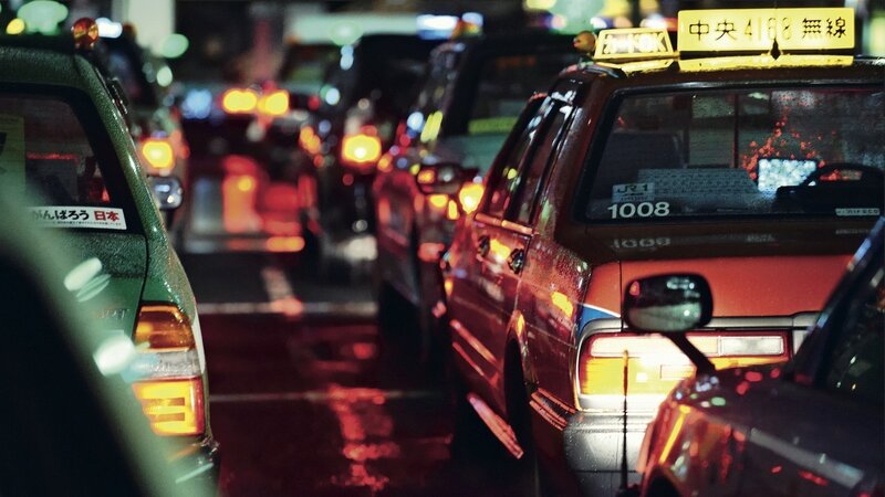 Line of Taxis at Night