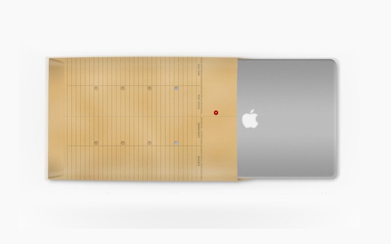 Lined paper envelope with laptop