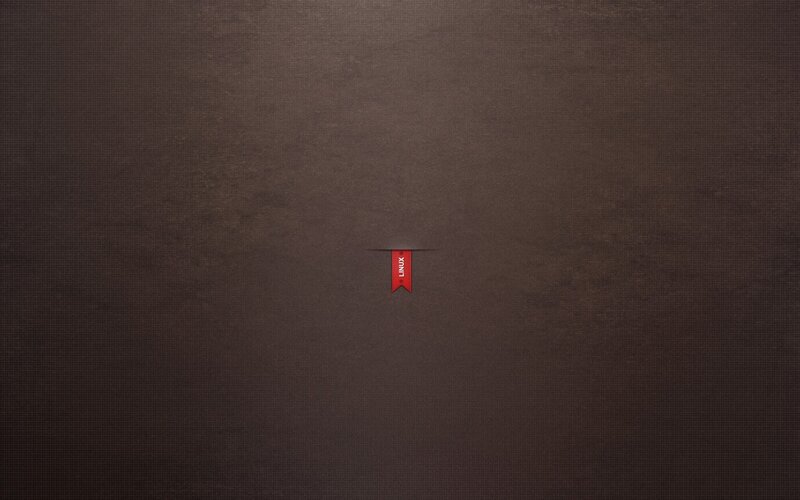 Linux logo on brown background