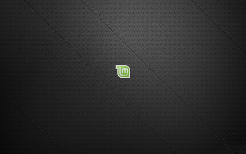 Linux Mint logo on dark background
