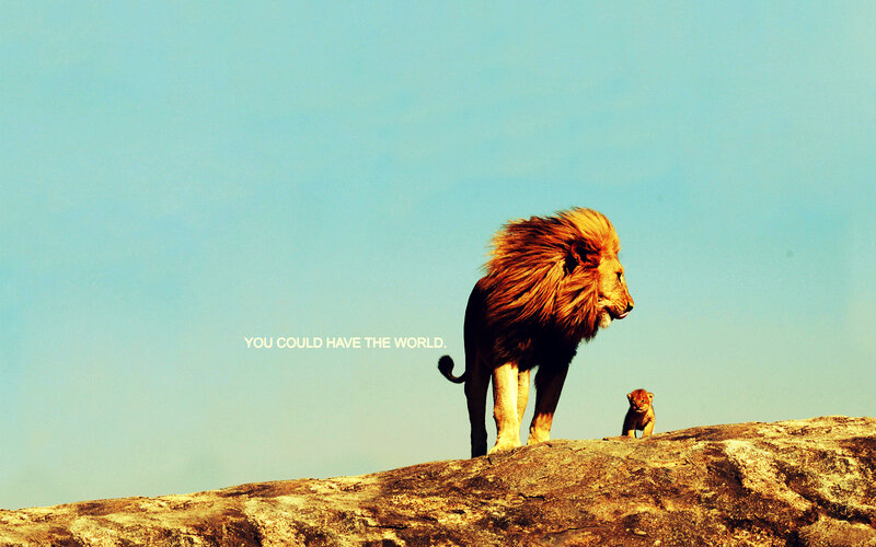 lion and cub on a rock