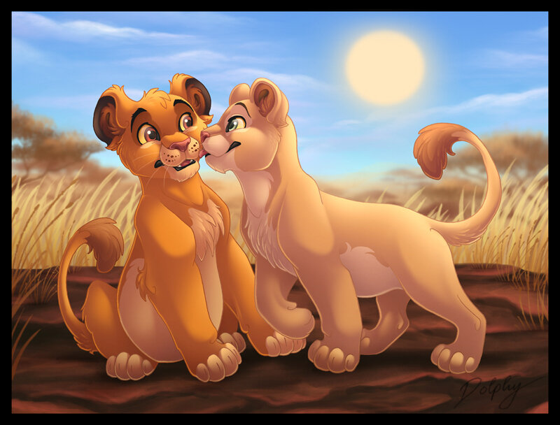 lion cubs in savanna