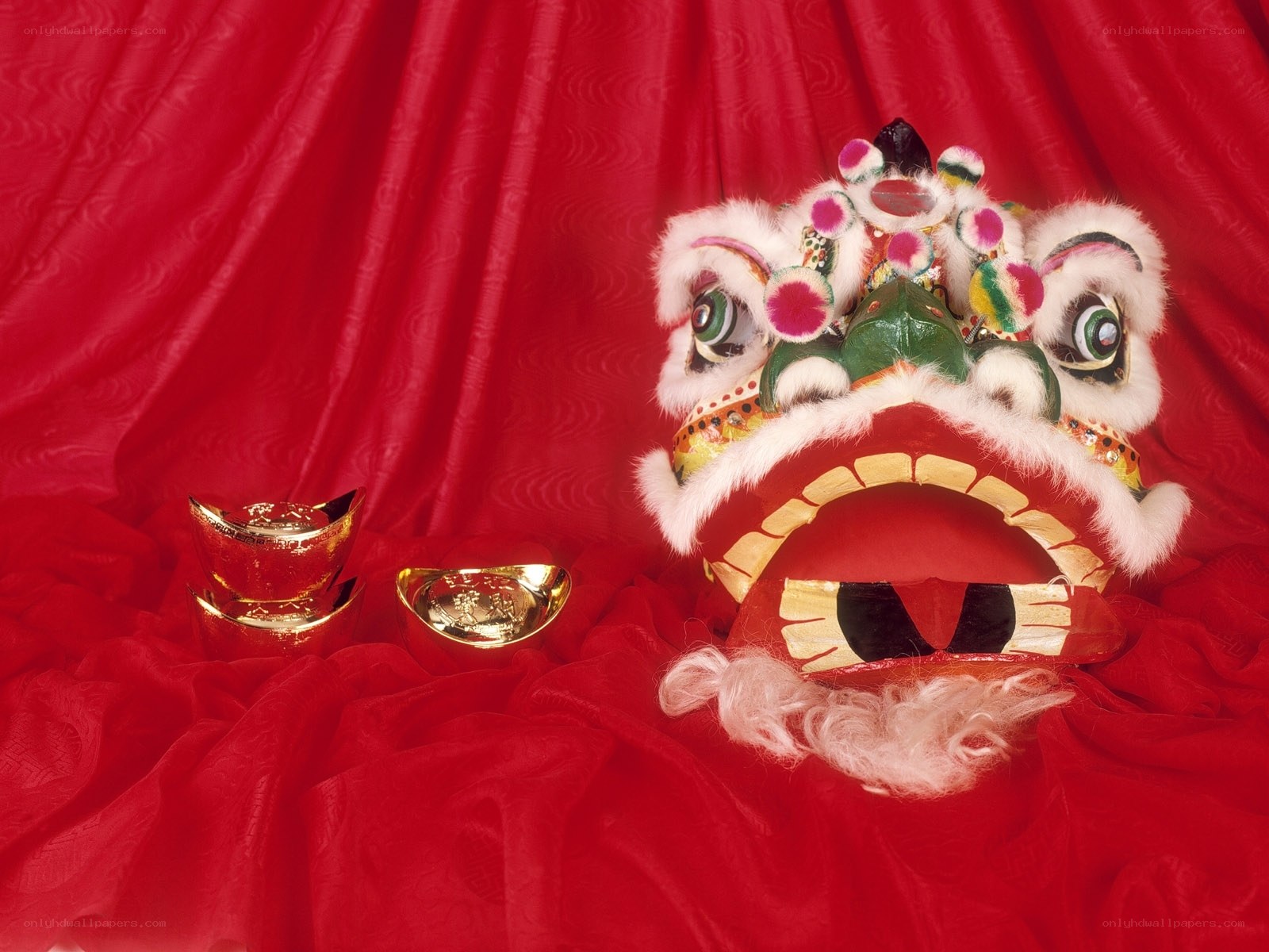 Lion dance head with gold ingots
